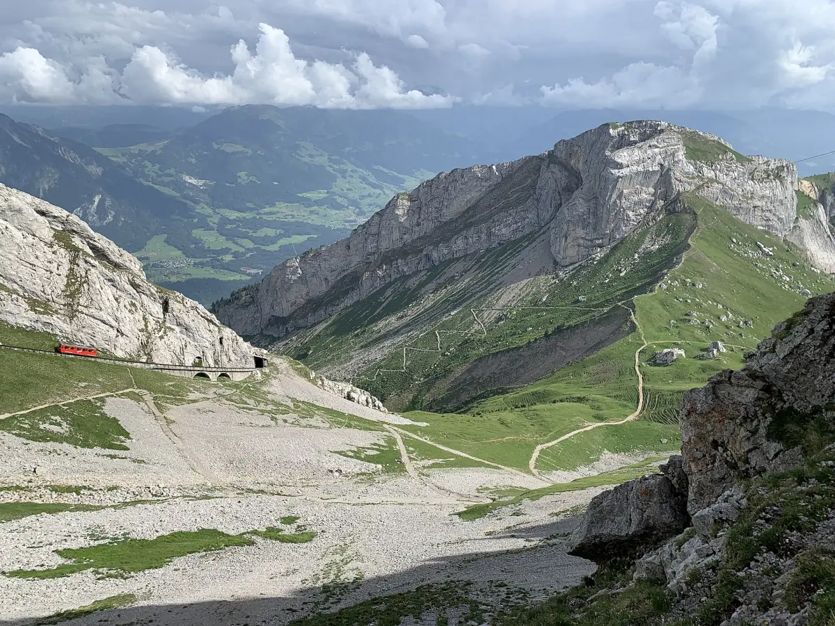 The Matthorn with a Pilatus railway train on the slope below